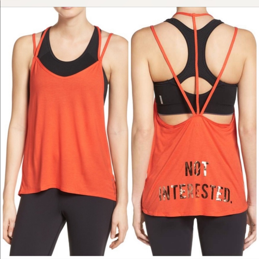 Reebok not interested orange active tank.
